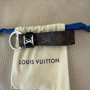 Louis Vuitton Brown Monogram Key Holder with Silver Hardware.